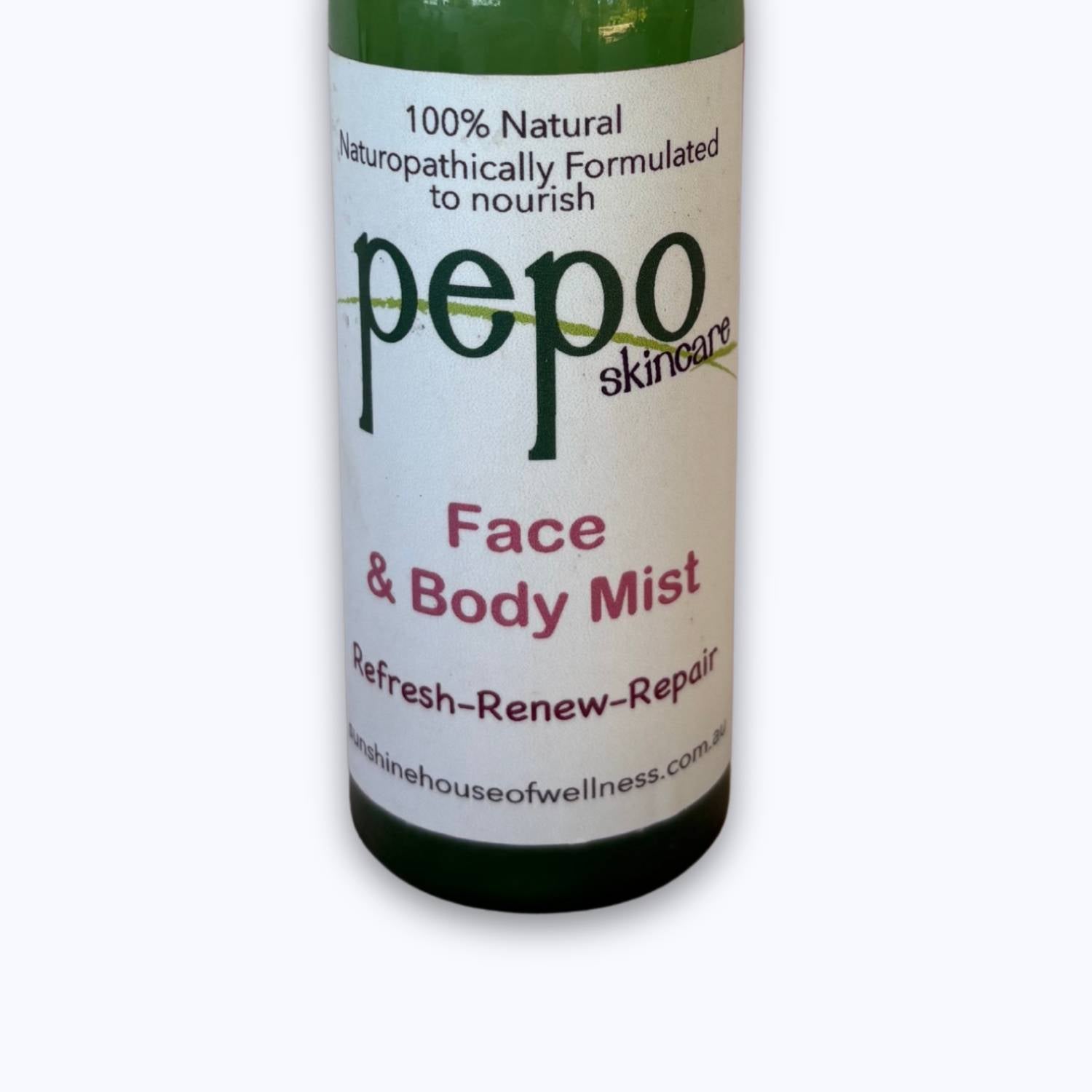 Bottle of 100% natural pepo skincare Face & Body Mist on a white background.