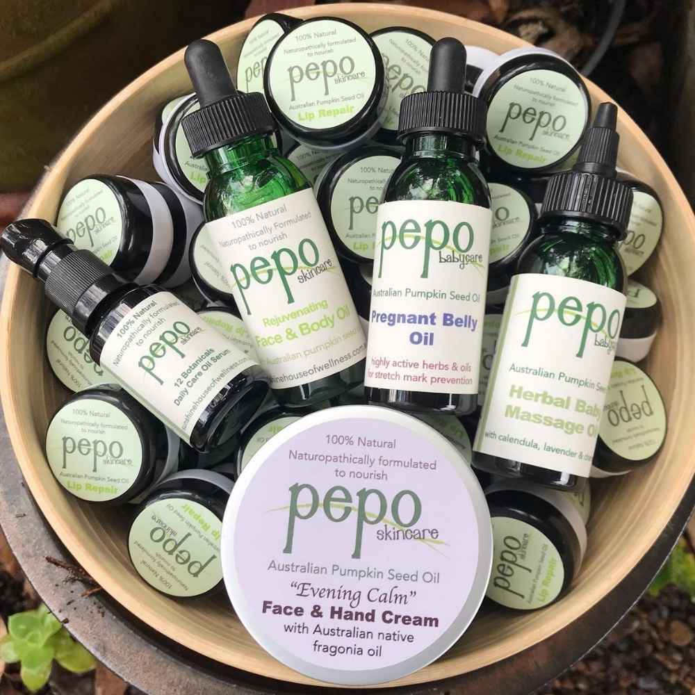 Assorted Pepo natural skincare products hand made in Australia and prepared in a wooden bowl