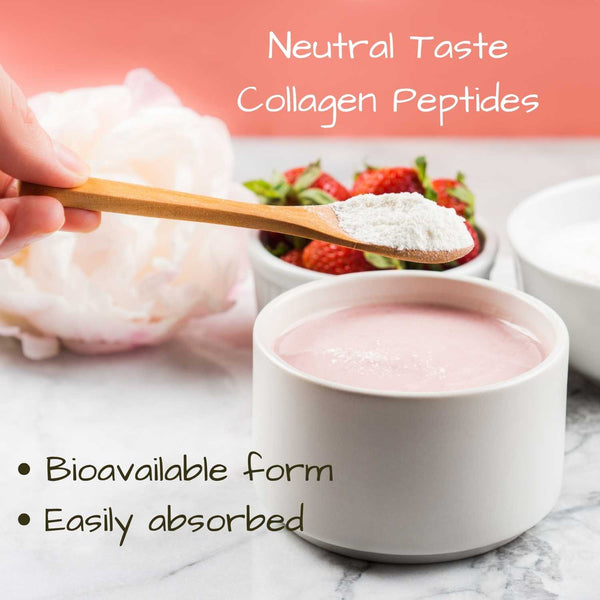 Neutral taste collagen peptides being scooped with a wooden spoon into a bowl of pink yoghurt, with strawberries in the background.